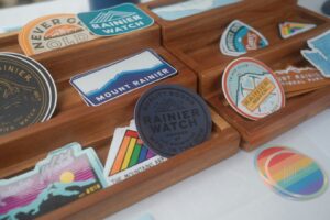 Wooden tray of sticker designs, allowing you to test new ideas before scaling