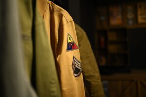 Detailed embroidered patches on a jacket sleeve, ensuring you get top quality products every time.